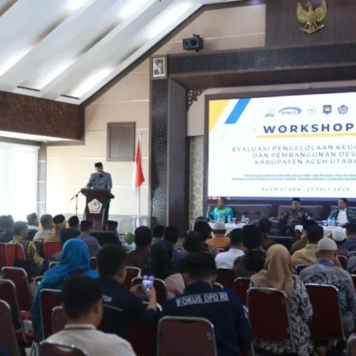 FOTO: Dayan Albar, SSos, MAP menbacakan sambutan Pj Bupati Aceh Utara