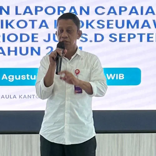 Foto: Sekretaris Daerah Kota Lhokseumawe, T, Adnan, SE saat membuka kegitan sosialisasi inovasi penyusunan laporan capaian kinerja Walikota melalui visualisasi data interaktif berbasis teknologi kecerdasan buatan (AI) kepada seluruh perangkat daerah.