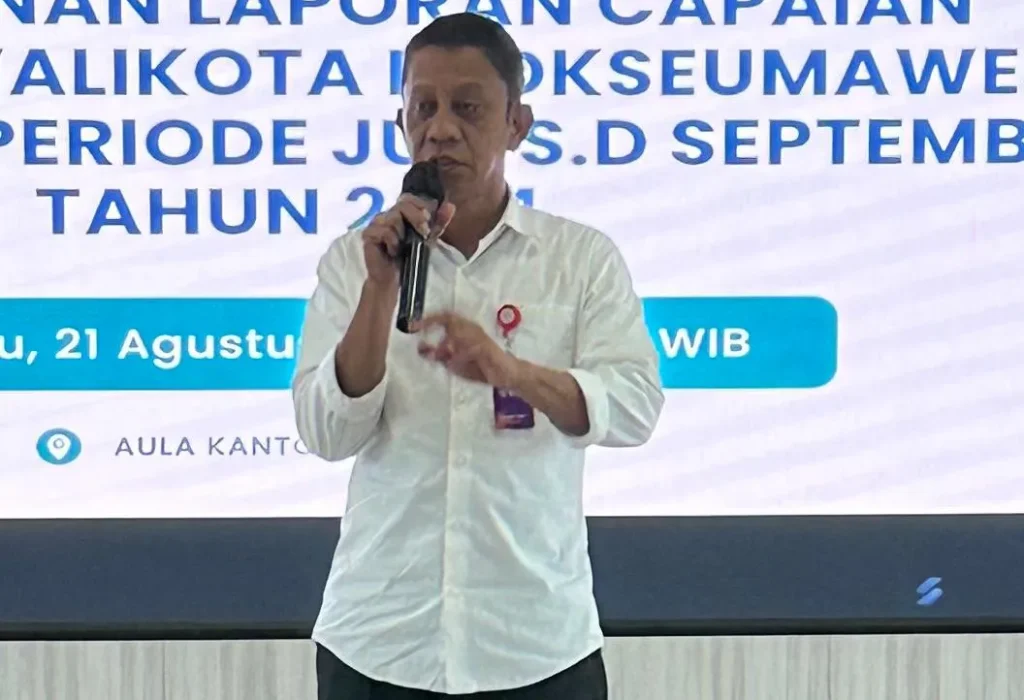 Foto: Sekretaris Daerah Kota Lhokseumawe, T, Adnan, SE saat membuka kegitan sosialisasi inovasi penyusunan laporan capaian kinerja Walikota melalui visualisasi data interaktif berbasis teknologi kecerdasan buatan (AI) kepada seluruh perangkat daerah.