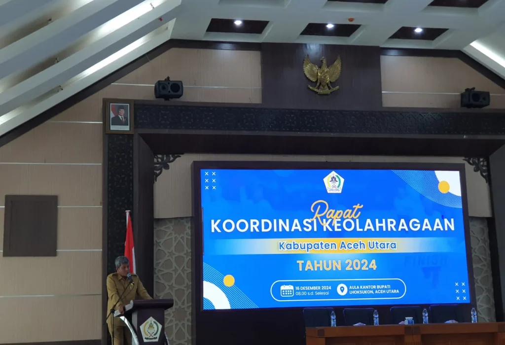 Foto: Pj. Sekda Aceh Utara, Dayan Albar membuka Rakor keolahragaan di aula kantor Bupati Aceh Utara, Landing